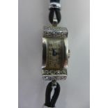 A pretty Art Deco style platinum and diamond Mappin wristwatch, the rectangular case set with 28
