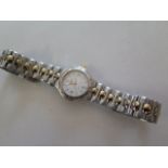 A ladies Longines conquest steel cased wristwatch with bracelet, gold highlights design L1 1313 -