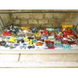 A collection of Disney Pixar and other toy cars, and vehicles, play worn condition