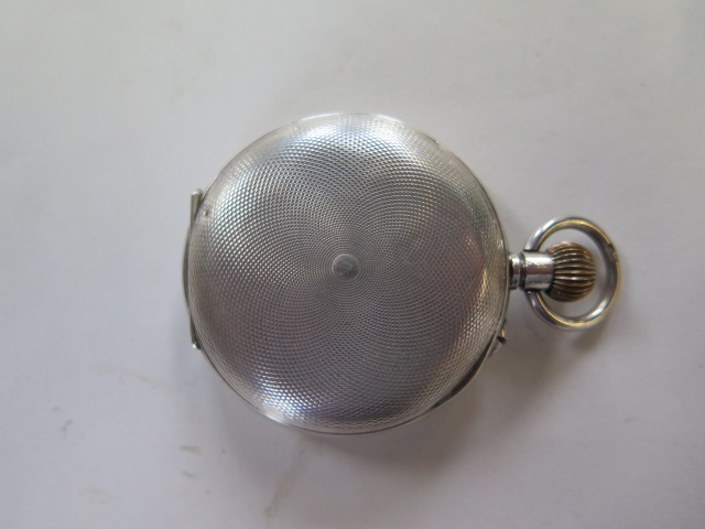 A silver Hebdomas 8 day gents pocket watch in working order, minor dents to case, slight damage to - Image 4 of 5