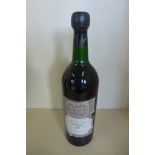 A bottle of 1966 Sandeman port, level to base of neck