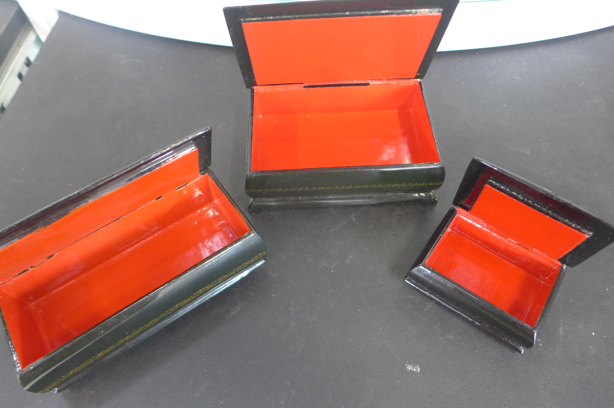 Three modern Russian lacquer boxes in black lacquer with hand painted decoration, all three with - Image 6 of 6