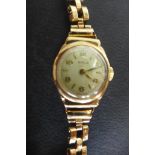 A ladies 9ct gold Rimla wristwatch and bracelet, gold weight 12 grams, 15 jewel Swiss movement,