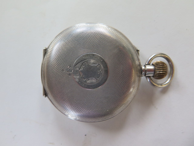 A silver Hebdomas 8 day gents pocket watch in working order, minor dents to case, slight damage to - Image 3 of 5