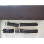 A gents steel cased Dunhill Automatic wrist watch, the chunky rectangular case with crown and
