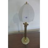 A vintage brass column table lamp with onyx base, tested, 57cm tall
