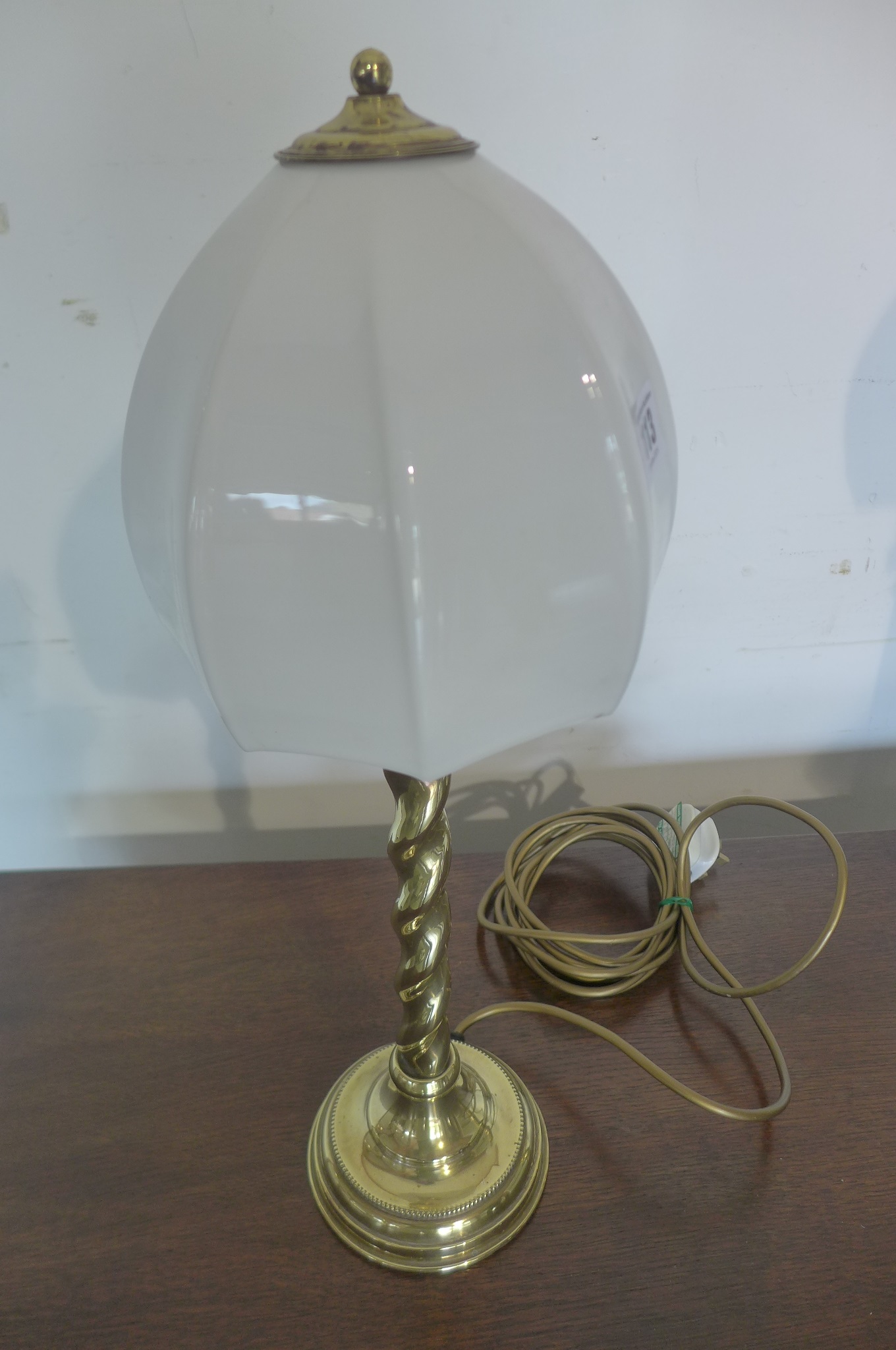 An early 20th century brass barley twist table lamp, tested, 49cm tall