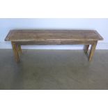 A rustic pine bench, 46cm H x 146cm x 32cm