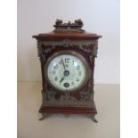 An ormulu mounted Leuzkirch carriage type mantle clock, 18cm tall, in good condition, working