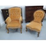 Two 19th century walnut chairs, one gents armchair with scroll arms and a matching nursing chair