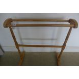 An Edwardian pine towel rail