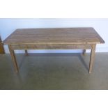 A rustic pine kitchen table - 75cm tall x 190cm x 84cm