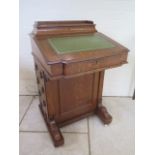 A Victorian oak Davenport with four active drawers, and a maple interior, 84cm tall x 54cm x 54cm