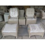 A Bramblecrest Oakridge pair of recliners with two footstools and a high glass coffee table, ex-