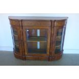 A 19th century walnut marquetry inlaid three door side cabinet, with bowed glass side doors, 108cm