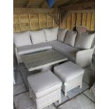 A Bramblecrest Patagonia mini modular sofa, with two stools and an adjustable glass table, ex-