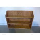 A stripped and waxed pine bookcase made from old timber, 100cm H x 127cm x 29cm