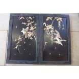 A pair of Chinese bird decorated panels in ebonised frames, 86x53 cm