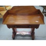 A 19th century mahogany washstand with a galleried back on twin pillar supports, 90cm W x 95cm H x