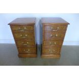 A pair of burr oak four drawer bedside chests, made by a local craftsman to a high standard