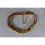 A 9ct yellow gold bracelet, probably made from a watch chain, general wear, some small dents, approx