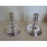 A pair of weighted silver dwarf candlesticks, 12cm tall, 12cm diameter, London 1969/70 - JHO