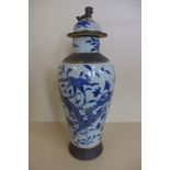 A 19th century Chinese crackle glaze baluster vase with lid, in good condition, 34cm tall