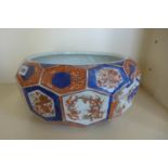 A large Imari faceted bowl, 19cm tall x 38cm wide, some wear to gilt but no obvious damage