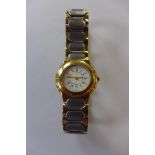 An Yves Saint Laurent ladies bi metal quartz wristwatch, no 328066 - running order, some minor usage