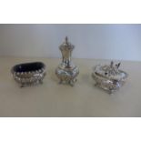 A silver Asprey and Co three piece cruet set including salt, mustard and pepperette, with