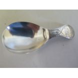 A fine bright cut silver caddy spoon, by Thomas Northcote, London 1789 - length 7.5cm, weight approx