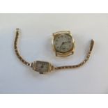 An 18ct gold watch head, not working, approx 23 grams, and a ladies 9ct watch, not working, on a 9ct