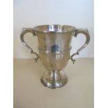 A Mappin and Webb twin handled trophy cup, Sheffield 1901/2 - no engraving, minor dent otherwise