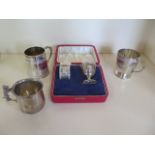 A silver coronation 1953 two piece christening set, boxed, and three silver tankards, total silver