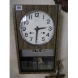 A Seiko 30 day time dater wall clock, 43c26cm - running