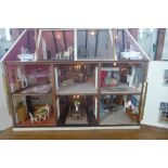 A beautiful 12th scale country manor style dolls house, Haversham hall comes completely furnished