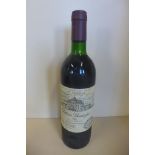 A bottle of 1981 Chateau Barreyres Haur Medoc red wine - level to base of neck