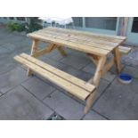 A timber picnic bench
