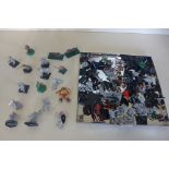 A collection of games workshop and other metal figures, some painted
