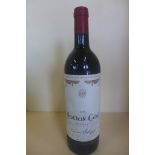 A bottle of 1984 Baron de Rothschild Mouton Cadet red wine - level below base of neck