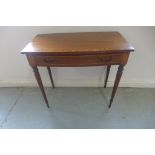 An Edwardian bow fronted single drawer side table on turned legs - 74cm H x 82cm x 45cm