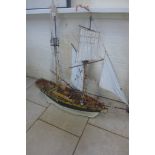 A hand built twin mast pirate Man O War sailing galleon with electric steering and sail control,