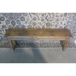 A rustic pine bench 48cm tall x 143cm x 32cm