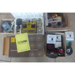 Three radio control units assorted, balloon wheels and two aeroplane engines