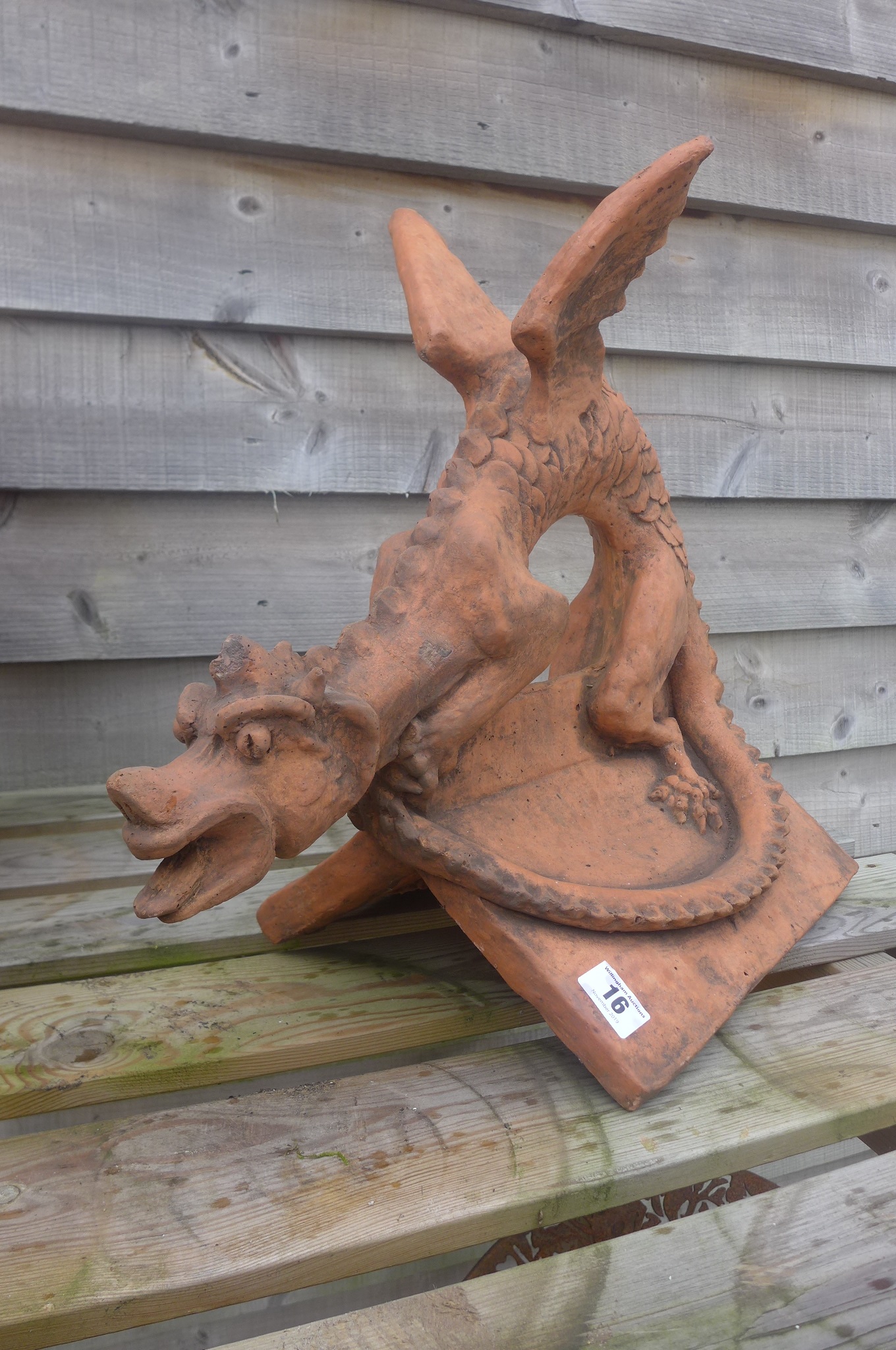 A dragon ridge roof tile finial, with a V ridge - 51cm L x 31cm W x 45cm H