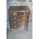 A 19th century style mahogany chest of small proportions, with two short over three long drawers,