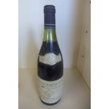 A bottle of 1977 Cote de Beaunne Villages Jean Bouchard red wine