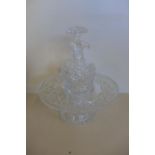 A cut glass decanter in stand, 30cm tall 25cm diameter, overall good condition