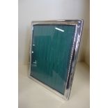 A large silver photo frame, 30x24cm - minor denting otherwise good