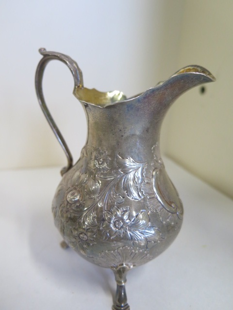 A Victorian embossed silver cream jug - 1847 - makers mark rubbed, height 23.5cm weight 4.7 troy - Image 2 of 3